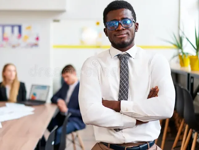 How to Make Money With AI Voiceovers: 7 Services You Can Sell to Businesses and Creators teamwork-background-inclusive-diverse-work-environment-confident-african-businessman-stands-modern-office-arms-crossed-pro-317585001